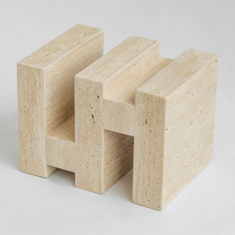 Interlocking travertine accent piece - minimalist geometric stone decor for home