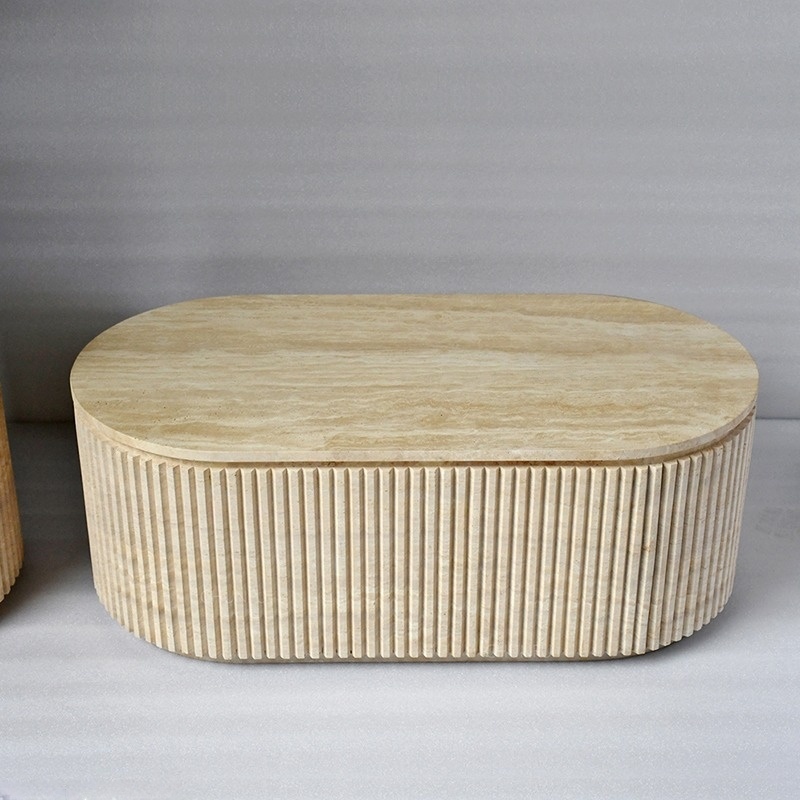 Close-up of travertine coffee table top - natural beige stone texture with subtle veining