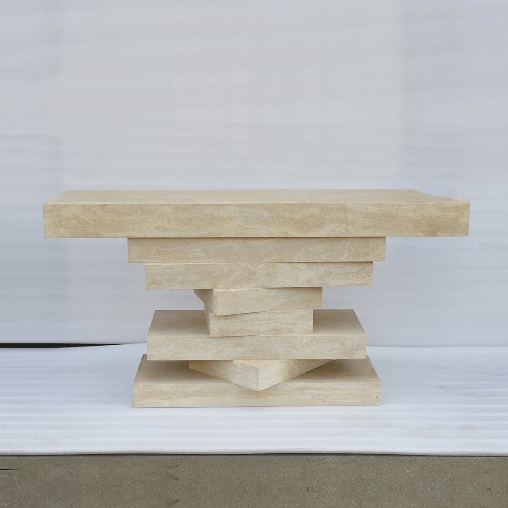 Close‑up of travertine console table - stacked stepped slab base and natural stone texture