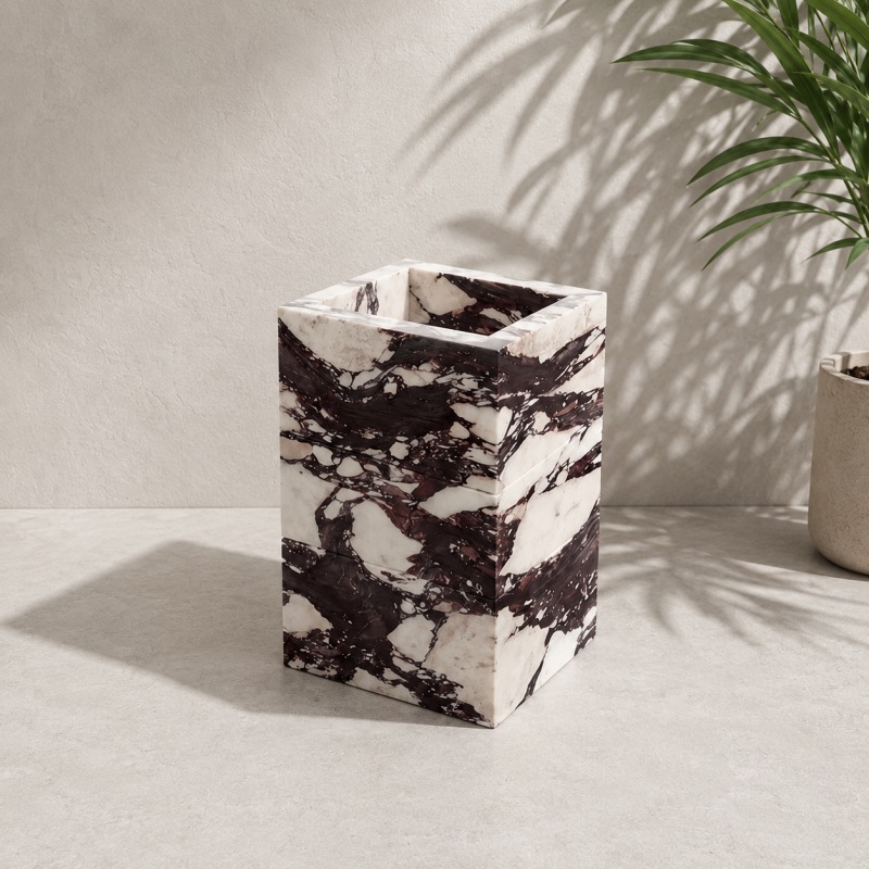 Solid wrapped Calacatta Viola marble bathroom vanity with recessed top sink cutout