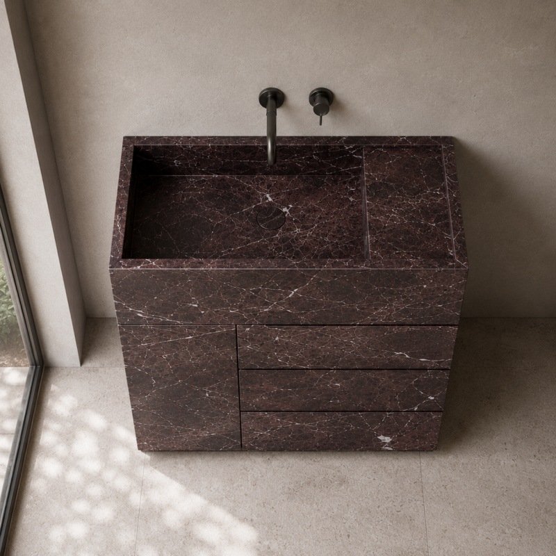 Close up of burgundy marble vanity surface with white natural stone veining